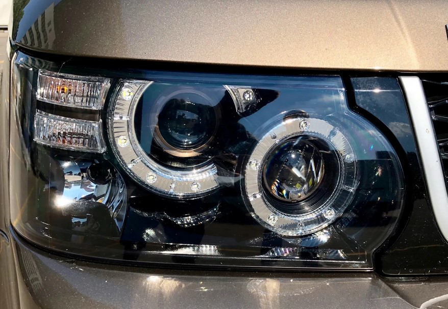 Замена лампы фары Range Rover Sport 2010